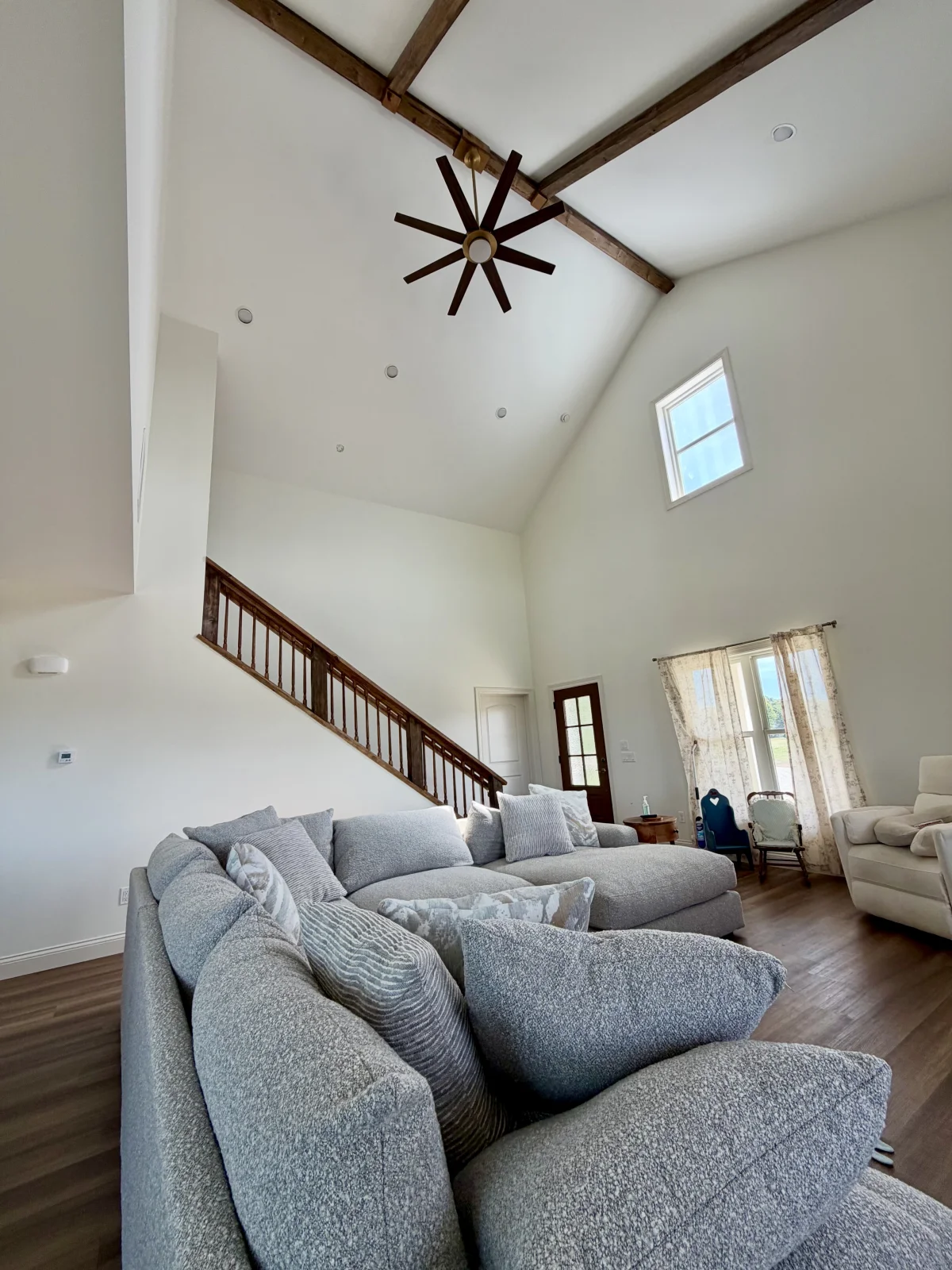Vaulted living room and stair in a New Haven custom home